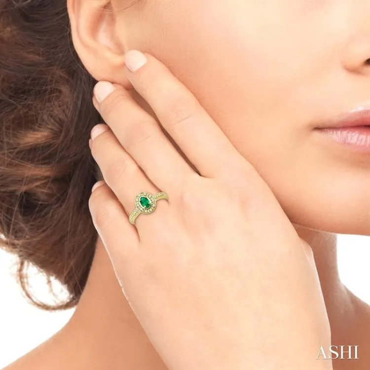 5x3mm Oval Shape Emerald and 1/10 Ctw Single Cut Diamond Ring in 14K Yellow Gold.