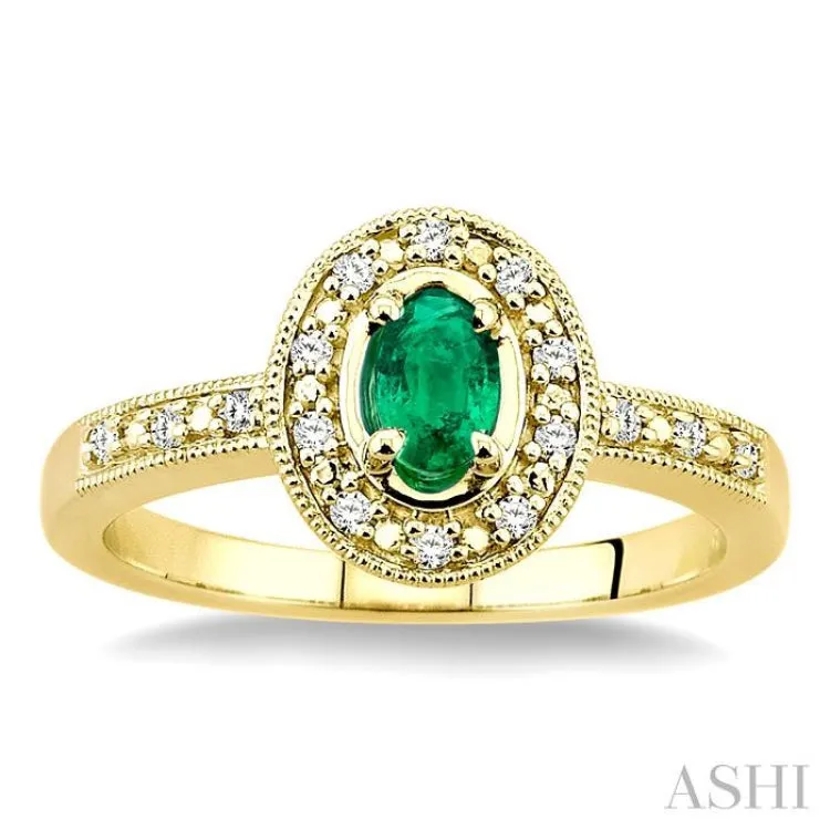 5x3mm Oval Shape Emerald and 1/10 Ctw Single Cut Diamond Ring in 14K Yellow Gold.