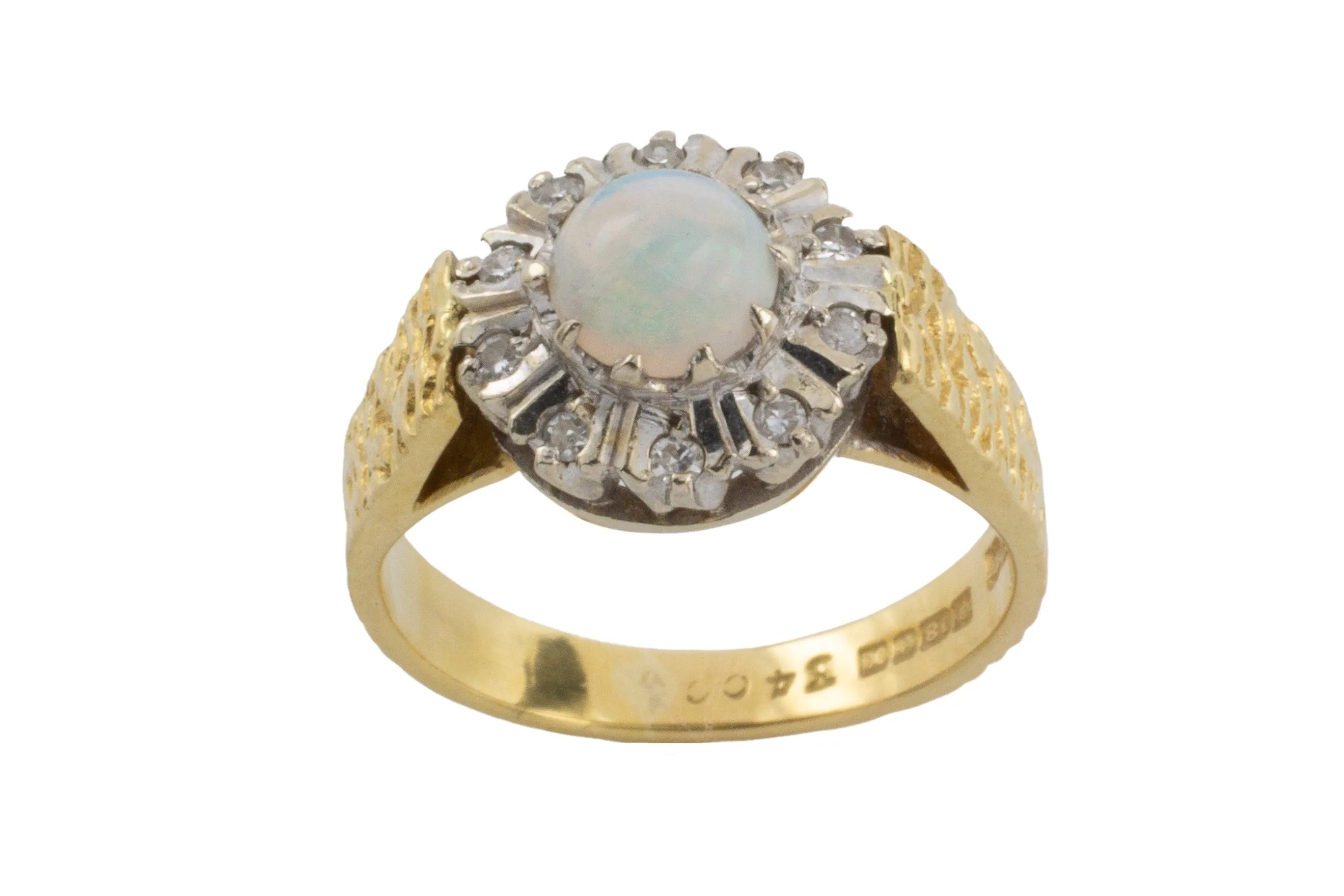 Opal and diamond ring in 18 carat gold