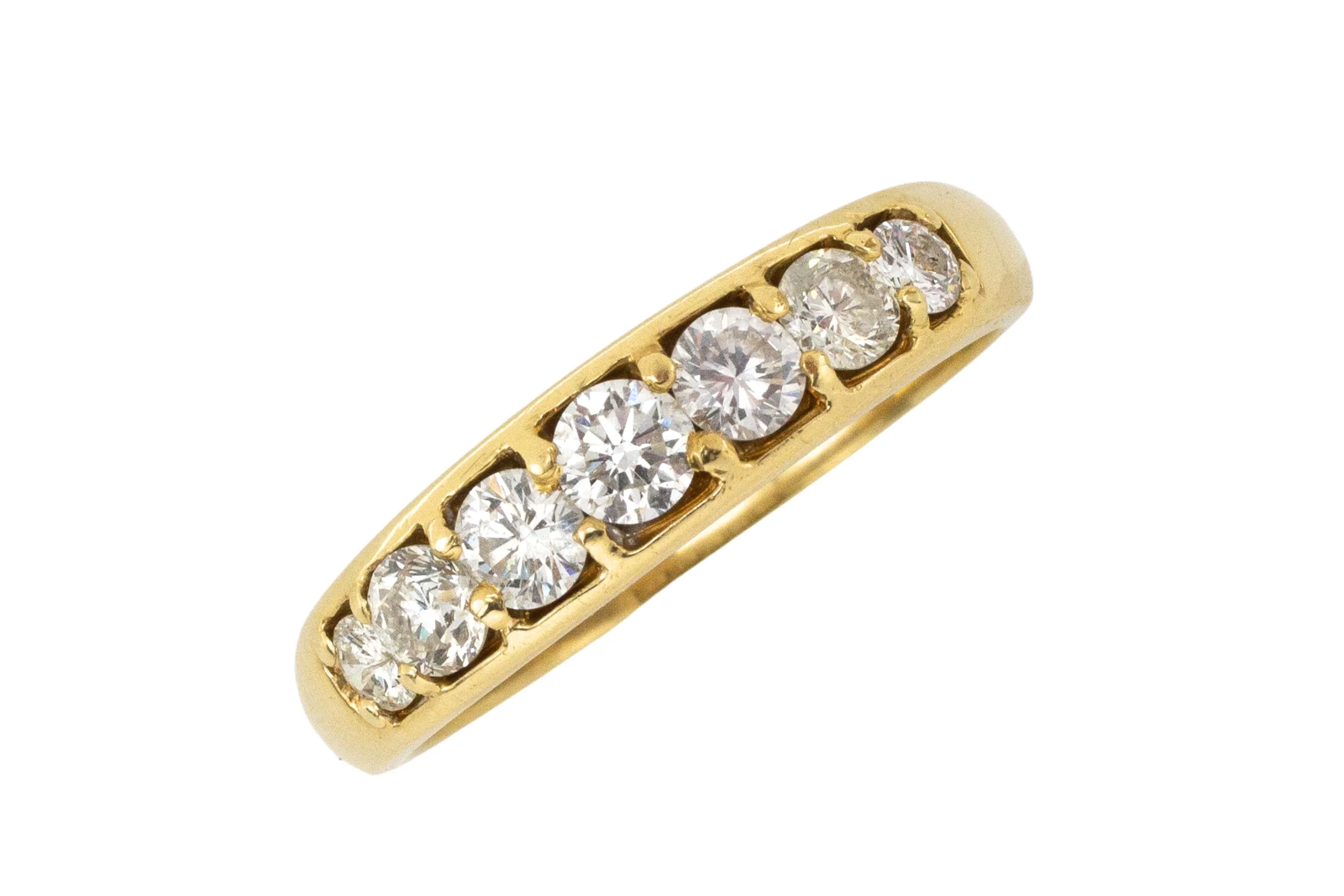 Seven stone diamond ring in 18 carat gold